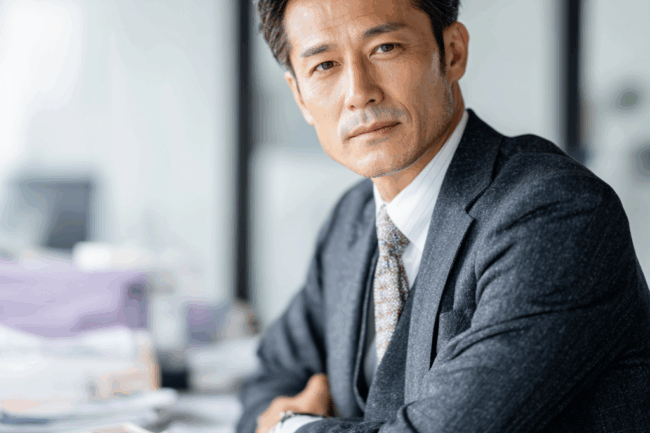 u8922936522_a_realistic_photo_of_a_Japanese_corporate_executi_5d6a9db4-c104-4271-b184-2325198a64cc_3